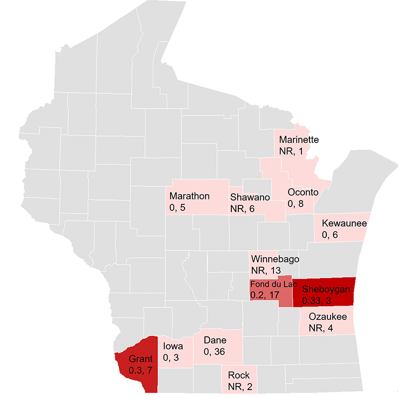 Map of Wisconsin with counties shaded red or pink. Darker counties trapped more slugs.