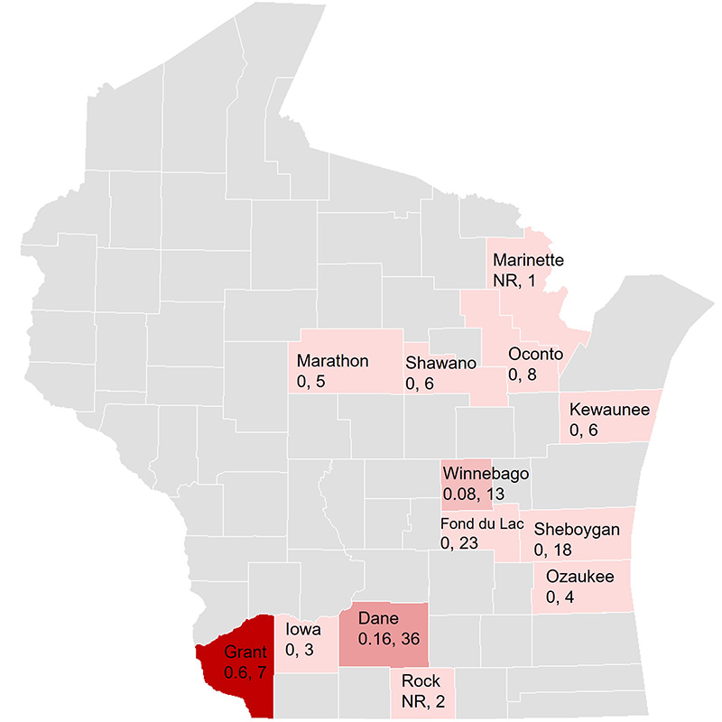 Map of Wisconsin showing slug presence data by county, with varying shades of red indicating different levels of slug presence.