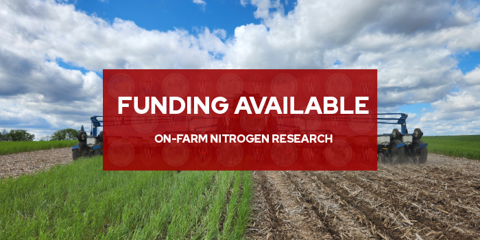 Funding available for on-farm nitrogen research. Red banner over a field trial showing green rye beside tilled crop rows.
